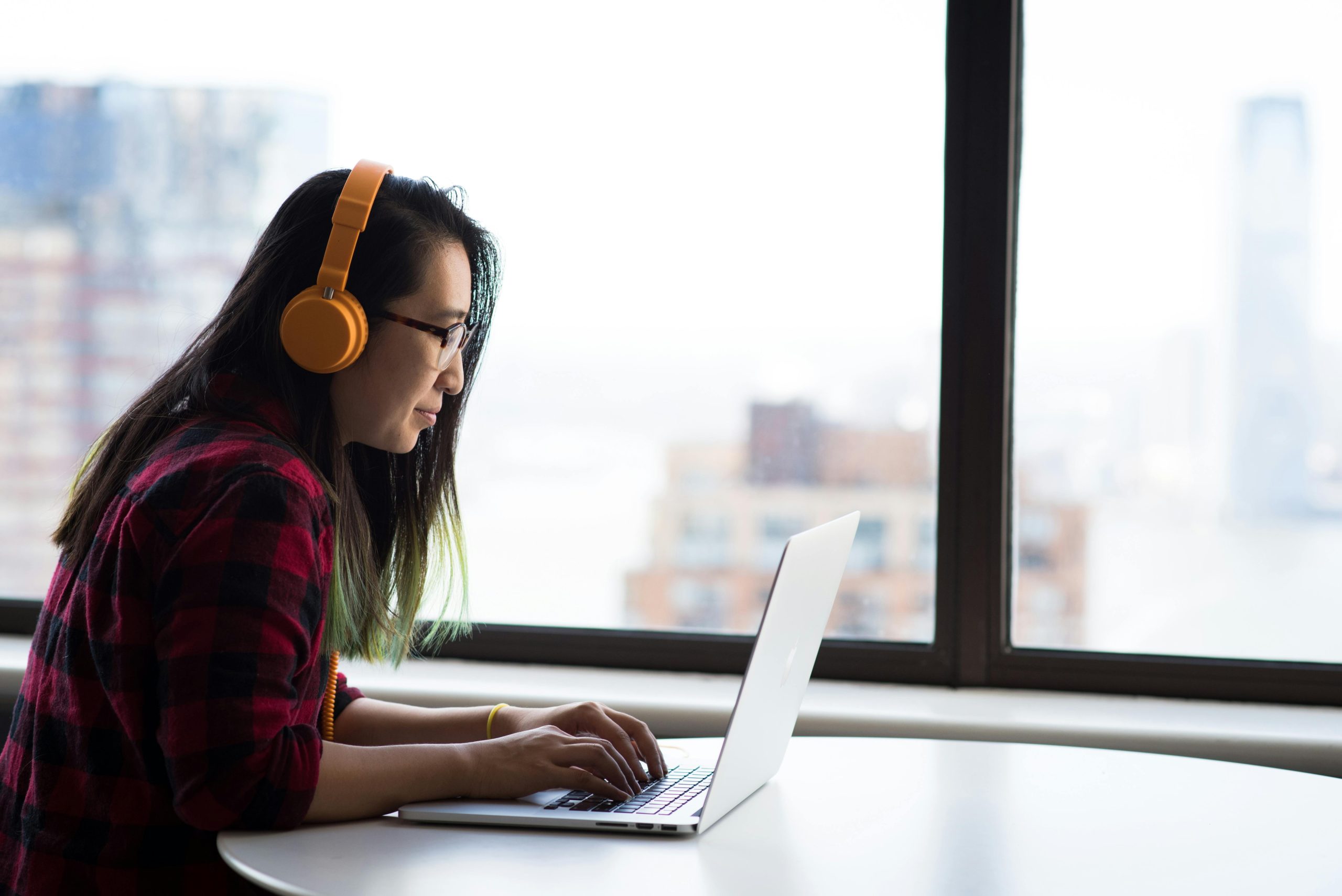 Lady working remotely on her laptop